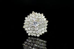 18CT FLOWER CLUSTER, total weight estimated 3.2ct with centre stone estimated 0.65ct,total weight