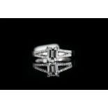 Diamond ring, set with 1 emerald cut diamond measuring approximately 6.3mm x 4.1mm x 3.5mm,