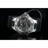 LADIES TAG HEUER KIRIUM DATE WRISTWATCH REF. WL1211-0, circular silver sunburst dial with silver and