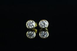Pair of diamond stud earrings, brilliant cut diamonds, estimated weight approximately 0.30ct each (