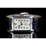 GENTLEMEN'S DUNHILL SILVER WRISTWATCH W/ ASPREY BOX, rectangular two tone dial with black arabic