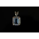 9ct Yellow Gold Aquamarine and Diamond pendant featuring centre emerald cut Aquamarine (2.50ct),