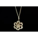 9CT PENDANT/BROOCH SET WITH SEED PEARLS,45cm curb chain, total weight 7 gms.