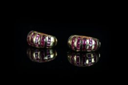 Ruby set clip on earrings, five rows of calibre cut Rubies, mounted in 18ct rose gold, French marks,