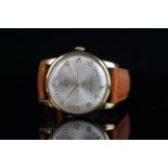 GENTLEMENS TUDOR ROYAL 9CT GOLD WRISTWATCH, circular silver dial with gold arabic numerals and