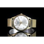 GENTLEMEN'S VINTAGE 9CT GARRARD , round, silver dial with gold hands, gold baton and arabic markers,