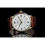 GENTLEMEN'S 9CT LONGINES WATCH CIRCA 1959, round, silver dial with gold hands, gold baton markers,