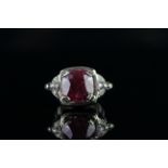 14ct White Gold Ruby and Diamond ring featuring centre, cushion cut, natural Ruby (11.04ct), claw