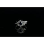 18CT WHITE GOLD SAPPHIRE AND DIAMOND CLUSTER, centre stone estimated as 4.3x 4.3mm, diamonds are a