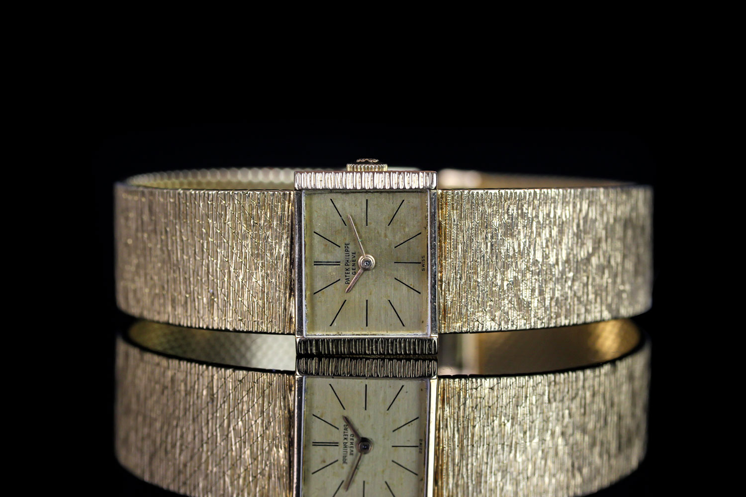 RARE LADIES' 18K YELLOW GOLD PATEK PHILIPPE, REF. 3322, INTEGRATED 18K BRACELET, VINTAGE MANUALLY