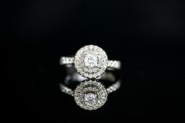 PLATINUM DIAMOND CLUSTER, centre stone estimated 0.32ct, ring size leading edge R 1/2,total weight 8