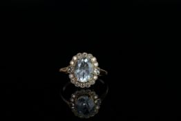 14ct Yellow Gold Aquamarine and Diamond ringfeaturing centre, oval cut, light blue Aquamarine (1.