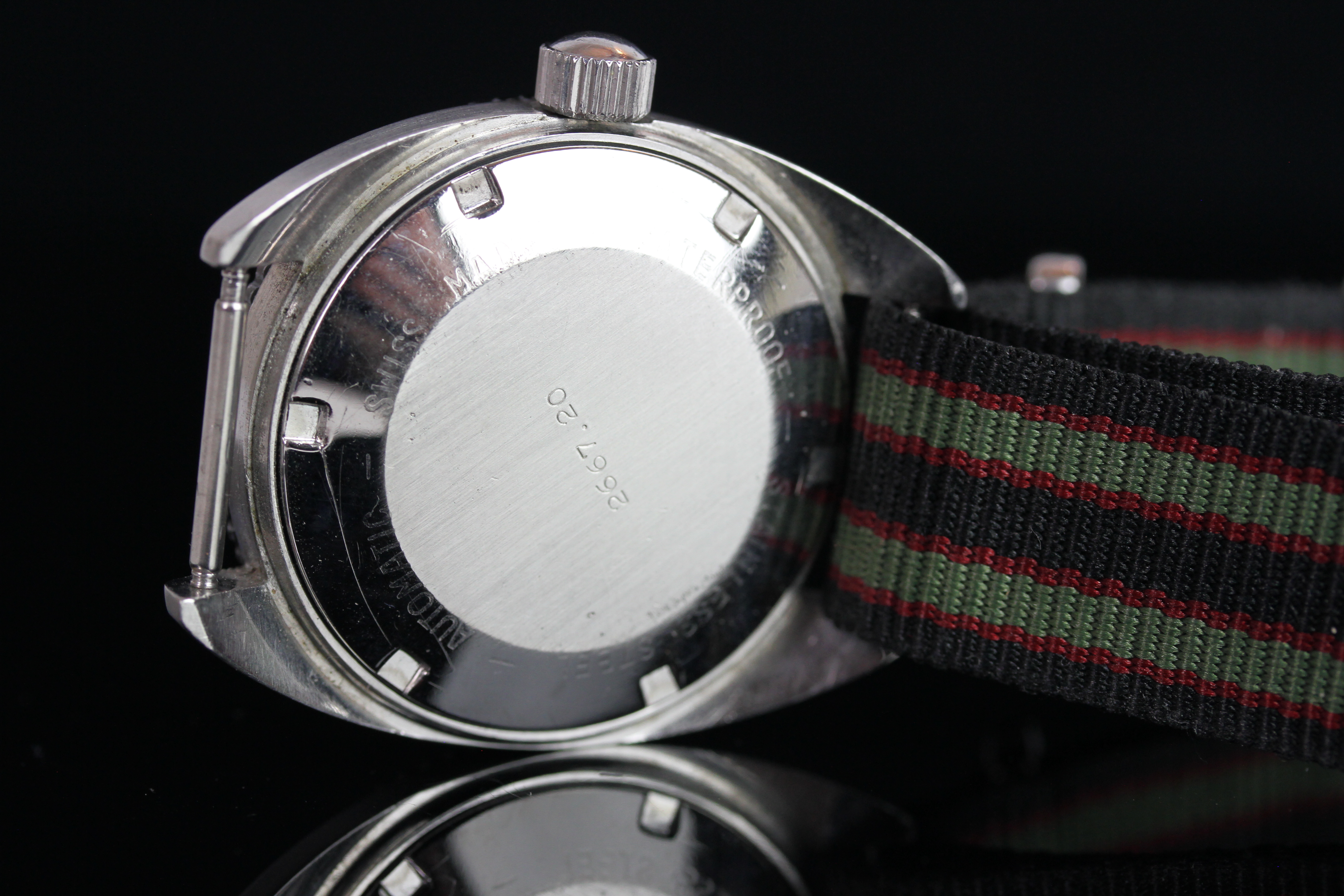 VINTAGE RODANIA AUTOMATIC DIVE WATCH, circular black dial with red and lime hour markers, day and - Image 3 of 3