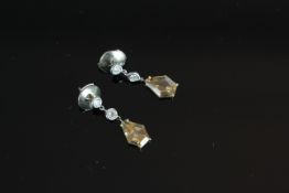 18CT DIAMOND FANCY COLOUR DROP EARRINGS,estimated 0.70ct and 0.80ct.