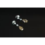 18CT DIAMOND FANCY COLOUR DROP EARRINGS,estimated 0.70ct and 0.80ct.