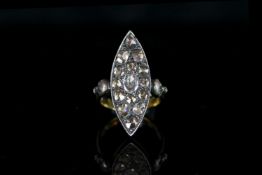 Rose cut diamond ring, silver marquise shape panel set with 15 rose cut diamonds, 2 skulls set