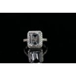 14ct White Gold Aquamarine and Diamond ring featuring centre, emerald cut, medium blue Aquamarine (