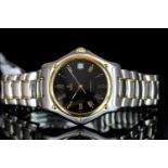 GENTLEMEN'S EBEL BI COLOUR AUTOMATIC WRISTWATCH, circular black dial with gold Roman numerals and