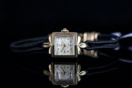 LADIES' OMEGA GOLD COCKTAIL WATCH, square off white dial with gold hour markers and gold hands, 16mm