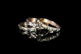 Group of 3 gold engraved rings, 1 with rose pattern, 1 with bay leaf pattern and 1 with olive