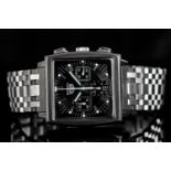 GENTLEMEN'S TAG HEUER MONACO, square, black dial with illuminated hands, illuminated batons, 45mm