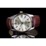 GENTLEMEN'S VINTAGE LONGINES CONQUEST CIRCA 1960s, round, silver dial with gold hands, gold baton