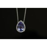 18ct White Gold Tanzanite and Diamond necklace/pendant featuring centre, pear cut, violet blue