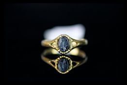 Single stone hematite signet ring, oval engraved hematite, set in 9ct yellow gold, ring size I,