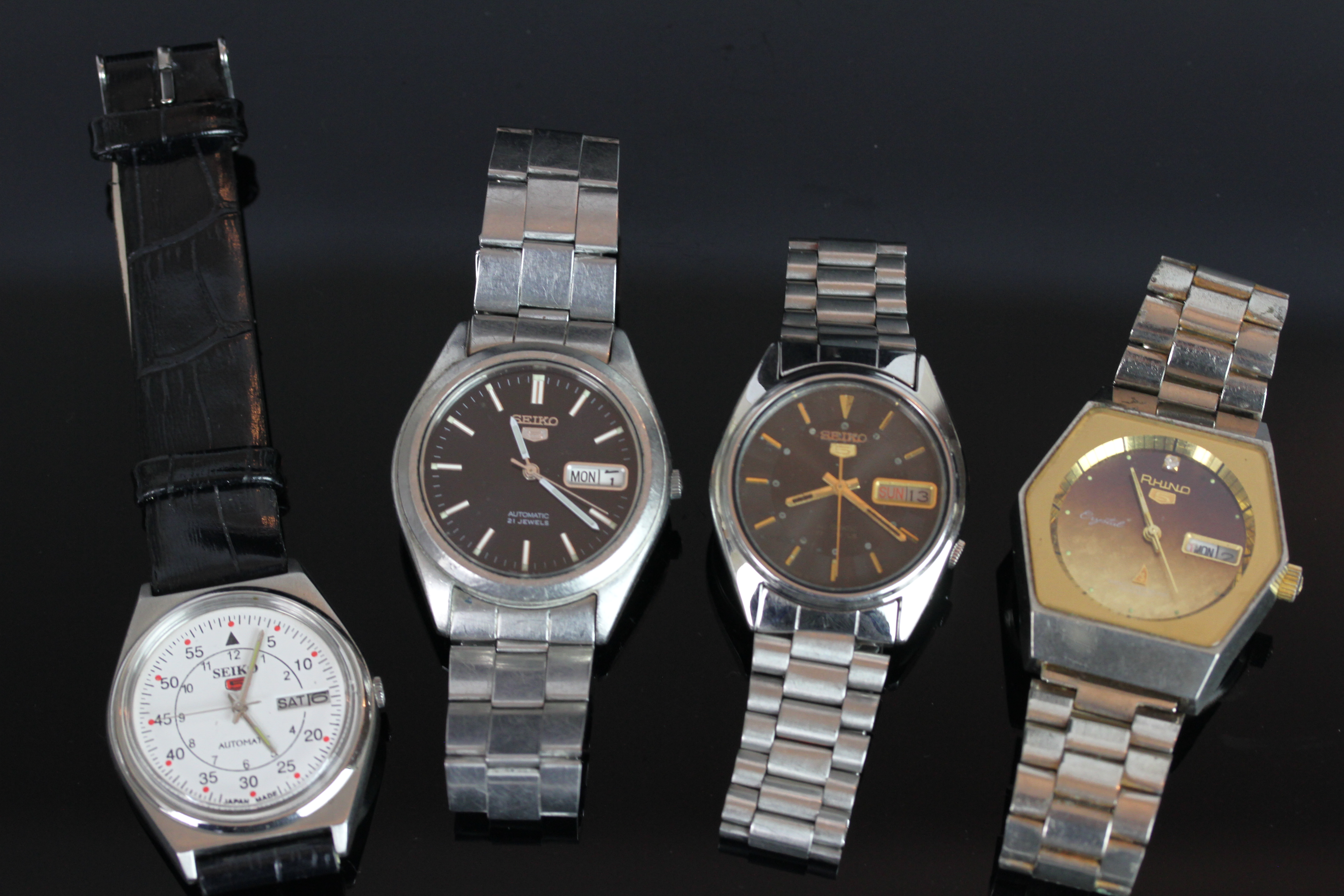 GROUP OF SEIKO 5 WRISTWATCHES, two with Seiko bracelets, all currently working except for the