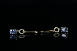 14ct Yellow Gold Sapphire and Diamond earrings featuring, 2 oval cut, Ceylonese Sapphires (2.22ct