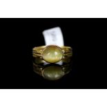 Cats Eye Chrysoberyl ring, Cabochon cut 12x10, heavy gold band, French marks, 18ct, ring size UK Z /