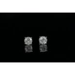 14ct White Gold Diamond stud earrings featuring, 2 round brilliant cut Diamonds (2.21ct TDW), 4-claw