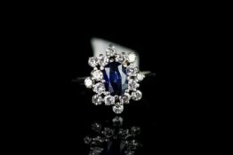 Sapphire and diamond ring, set with 1 oval cut sapphire measuring approximately 7.92mm x 5.42mm,