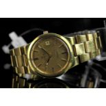 GENTLEMEN'S OMEGA GENEVE AUTOMATIC DATE WRISTWATCH, circular champagne dial with gold and black hour