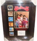 Jackson 5, Index card signed in black marker by Michael Jackson. Presented with a photo signed by