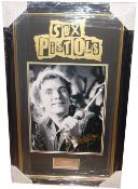 John Lydon, 16x12 photo signed in gold by John Lydon from the Sex Pistols. Profesionally framed