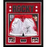 Official licened blood stained Rocky shorts hand signed extremely clear in black marker by