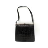 Loewe, black crocodile skin, with small black leather shoulder strap, with silver hardware. W26cm