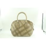 Burberry small orchard embossed gold leather in the quintessential logo. Gold colour hardware and