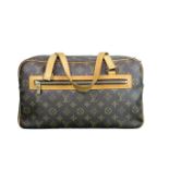 Louis Vuitton Cite GM bag in the classic monogram canvas with leather trim and gold tone hardware,