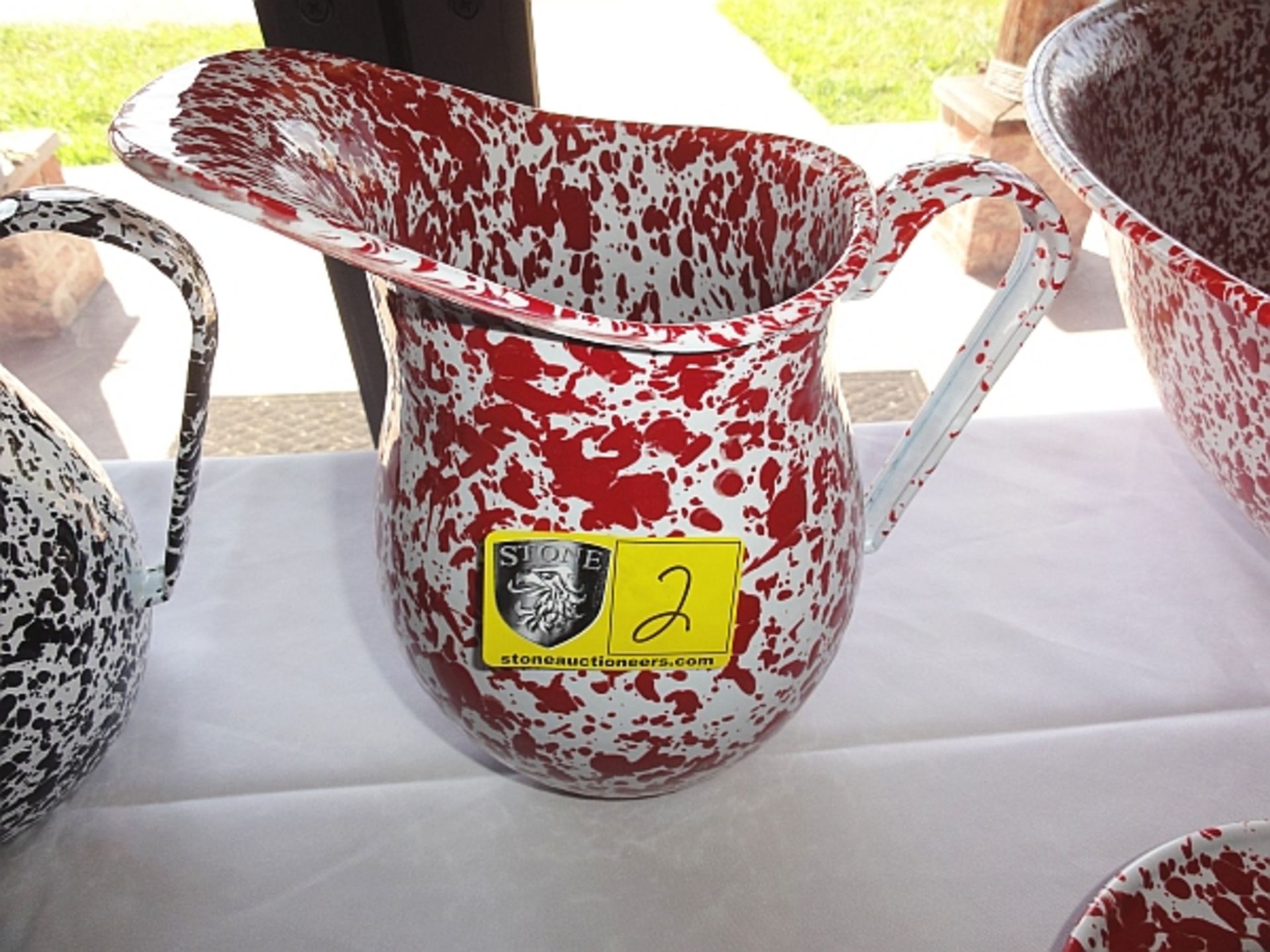 GRANITEWARE PITCHERS, RED