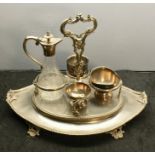 antique silver plated stand with cut glass bottle ornate dolphin handles measures approx 36cm wide b