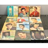 12 Elvis Presley singles includeshow great thu art , sings old shep , jailhouse rock , such a night