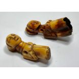 2 Antique Tribal Ivory Carvings Both similar with dark brown patina height approx 8cm