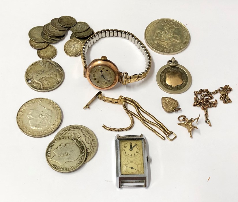 Tin of misc items includes 9ct gold ladies watch ,silver coins etc