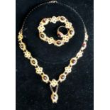 Fine Antique continental gold and Garnet set necklace bracelet and ring set hallmarked on clasp 585