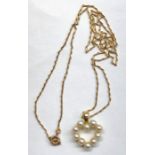 18ct gold and pearl heart shaped pendant on 18ct gold chain pendant measures approx 21mm by 17mm