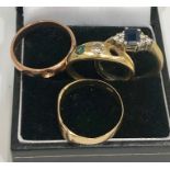 4 gold rings 2 are 18ct and 2 9ct total weight ..18ct 6g and 9ct 5.8g