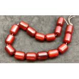 Barrel shaped cherry Amber bakelite Islamic prayer beads ,.