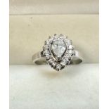 14ct white gold and diamond ring lrge central diamond measures approx 6mm by 4.5mm et with small dia